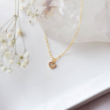 006 ($42) Little Gold CZ heart necklace