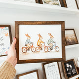 044 ($42) Bunnies on Bikes Framed Sign | Spring Sign