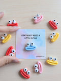 000 ($7) Uplifted Ink - Mini Smile Card with Figurine