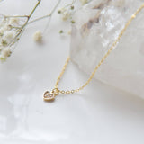 006 ($42) Little Gold CZ heart necklace