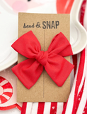 000 ($12) Bend & Snap - Holiday Bows