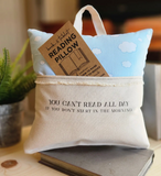 000 ($30-$55) Desmond Brown - Reading Pillows