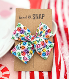 000 ($12) Bend & Snap - Holiday Bows