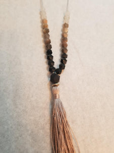 108 ($57) 1/2 Mala w Silk Tassel